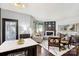 Cozy living room boasts a fireplace, stylish furniture, and a door that floods the space with natural light at 344 Kennebel Pl, Fort Mill, SC 29715