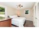 Comfortable bedroom with hardwood floors, ceiling fan, and closet at 4200 Tyndale Ave, Charlotte, NC 28210