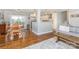 Open-concept living space with a view of the dining area and kitchen, showcasing modern design at 4200 Tyndale Ave, Charlotte, NC 28210