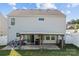 Backyard featuring a covered patio with a built-in grill, perfect for outdoor gatherings and entertaining at 4313 Gibbon Crossing Dr, Charlotte, NC 28269