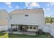 Large backyard featuring a covered patio and fenced yard perfect for families and pets at 4313 Gibbon Crossing Dr, Charlotte, NC 28269