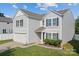 Charming two-story home featuring a gray siding, attached garage, and well-maintained landscaping at 4313 Gibbon Crossing Dr, Charlotte, NC 28269