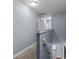 Hallway with carpeted stairs and blue walls leading to the upper level of the home at 4313 Gibbon Crossing Dr, Charlotte, NC 28269