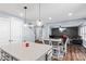Open kitchen with island, pendant lights, and seamless flow to the living area at 4313 Gibbon Crossing Dr, Charlotte, NC 28269