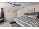 Spacious bedroom with a ceiling fan, king bed, and neutral color scheme at 4313 Gibbon Crossing Dr, Charlotte, NC 28269