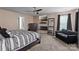 Large main bedroom with a sitting area, TV, and fireplace at 4313 Gibbon Crossing Dr, Charlotte, NC 28269