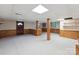 Spacious finished basement with a wet bar and paneled walls at 46 Donna Dale Se Ave, Concord, NC 28025