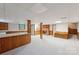 Finished basement area featuring a wet bar, fireplace, and stairway at 46 Donna Dale Se Ave, Concord, NC 28025
