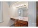 Bathroom vanity featuring marble countertop and cabinet storage space below at 46 Donna Dale Se Ave, Concord, NC 28025