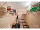 Walk-in closet with wire shelving offering ample storage solutions at 46 Donna Dale Se Ave, Concord, NC 28025