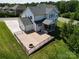 Aerial view of the backyard and patio, perfect for entertaining at 509 Abelia Ln, Tega Cay, SC 29708
