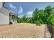 Spacious patio with fire pit offers perfect spot for outdoor entertaining and relaxation at 509 Abelia Ln, Tega Cay, SC 29708