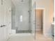 Modern bathroom features a tiled shower with a glass partition and a built-in bench at 509 Abelia Ln, Tega Cay, SC 29708