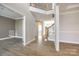 Welcoming foyer boasts a beautiful staircase and opens to a spacious living area at 509 Abelia Ln, Tega Cay, SC 29708