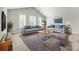 Bright living room featuring stylish furniture, plush rugs, and lots of natural light at 509 Abelia Ln, Tega Cay, SC 29708