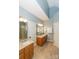 Bright bathroom boasts double vanities, neutral color palette, and a clean, modern aesthetic at 5485 Deer Run Ct, Davidson, NC 28036