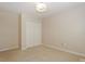 Neutral bedroom featuring carpet and a closet for storage at 5485 Deer Run Ct, Davidson, NC 28036
