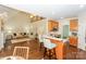 Open concept living space with seamless flow between kitchen, dining, and living areas at 5485 Deer Run Ct, Davidson, NC 28036