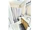 Cozy bathroom featuring a shower, toilet, sink and grey-themed decor at 5728 Rocbridge Ln, Charlotte, NC 28208