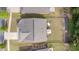 An overhead view of the house, highlighting the roof and well-maintained lawn with outdoor furniture at 6007 Eleanor Rigby Rd, Charlotte, NC 28278
