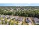 An aerial view showcasing a neighborhood with tree-lined streets and well-maintained homes at 6007 Eleanor Rigby Rd, Charlotte, NC 28278