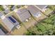 An aerial view showcasing a well-maintained lawn, fenced backyard, and neighborhood surroundings at 6007 Eleanor Rigby Rd, Charlotte, NC 28278