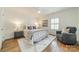 Cozy bedroom featuring a soft rug, neutral decor, and natural light at 601 Cherokee Rd, Charlotte, NC 28207