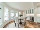 Dining area with butler's pantry, wine fridge, and natural light at 601 Cherokee Rd, Charlotte, NC 28207