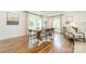 Bright dining room with wood table, large windows, and elegant decor at 601 Cherokee Rd, Charlotte, NC 28207