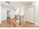 Upstairs landing area with hardwood floors and ample closet space at 601 Cherokee Rd, Charlotte, NC 28207
