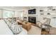 Cozy living room with fireplace and views of the dining area at 601 Cherokee Rd, Charlotte, NC 28207