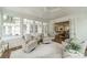 Bright sunroom with ample natural light, stylish furniture, and an open floor plan at 601 Cherokee Rd, Charlotte, NC 28207