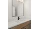 Bathroom featuring a modern sink, wood vanity, and a mirror at 605 Poplar St, Shelby, NC 28150