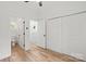 Bedroom and adjoining rooms featuring wood-look floors and white doors at 605 Poplar St, Shelby, NC 28150