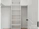 Bright closet with shelving and hanging rod, providing ample storage space at 605 Poplar St, Shelby, NC 28150