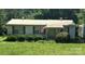 Quaint single-story home with a metal roof, complemented by tidy landscaping and a well-manicured lawn at 6544 Helens Way, Denver, NC 28037