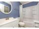Bathroom featuring a vanity, toilet and a shower-tub combination with a curtain at 6577 Stoney Ridge Rd, Matthews, NC 28104