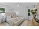 Calming bedroom with plush king bed and bright windows at 7219 Brynhurst Dr, Charlotte, NC 28210