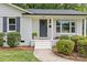 Up close view of the front door with white painted steps at 7219 Brynhurst Dr, Charlotte, NC 28210