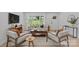 Bright living room with neutral furniture and open floor plan at 7219 Brynhurst Dr, Charlotte, NC 28210
