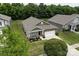 An aerial view of the home featuring a manicured lawn and neighborhood at 7328 Strawberry Fields Ln, Charlotte, NC 28278