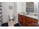 Bathroom featuring double sinks, granite counters, and modern fixtures, offering convenience and style at 7328 Strawberry Fields Ln, Charlotte, NC 28278