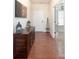 Home entryway with hardwood floors, console table, and french door at 7328 Strawberry Fields Ln, Charlotte, NC 28278
