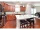 Bright kitchen featuring granite countertops, stainless steel appliances, and a center island at 7328 Strawberry Fields Ln, Charlotte, NC 28278