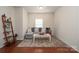Cozy living room with a gray sofa, white coffee table, and decorative accents, perfect for relaxation at 7328 Strawberry Fields Ln, Charlotte, NC 28278