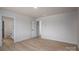 Bright bedroom with an open door to an en-suite bathroom and natural light at 823 32Nd Ne St, Conover, NC 28613
