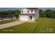 Two-story home with a spacious yard, a detached garage and long driveway at 823 32Nd Ne St, Conover, NC 28613