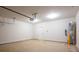 Spacious garage featuring bright lighting and ample room for parking and storage at 823 32Nd Ne St, Conover, NC 28613