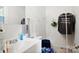 Practical bathroom featuring white fixtures, ample storage, and functional design at 924 Carrington Dr, Charlotte, NC 28214