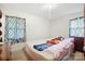 Bright bedroom with comfortable bed, soft lighting, and neutral walls, creating a serene and restful space at 924 Carrington Dr, Charlotte, NC 28214